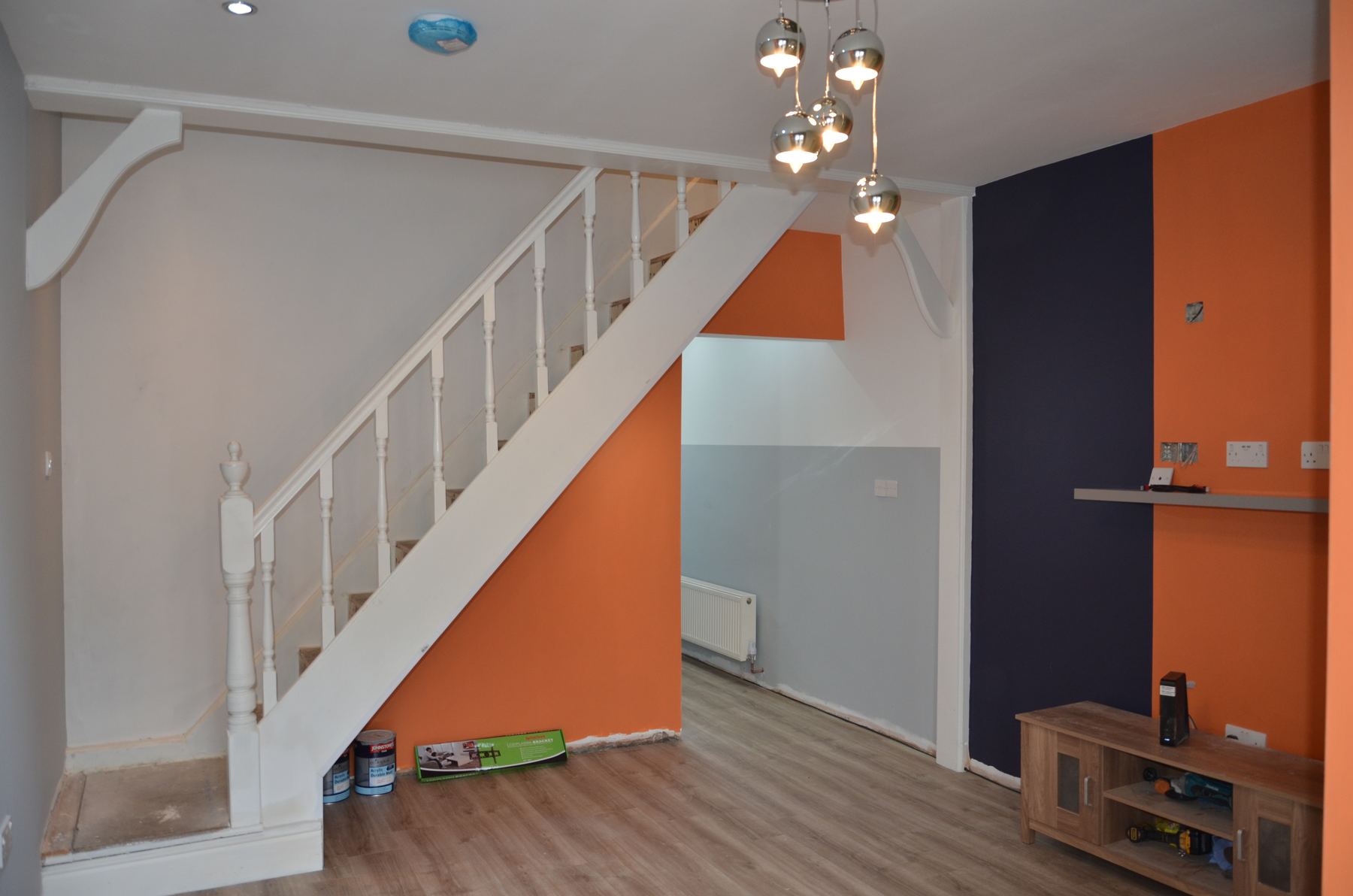 Shared living space and stairs after refurbishment