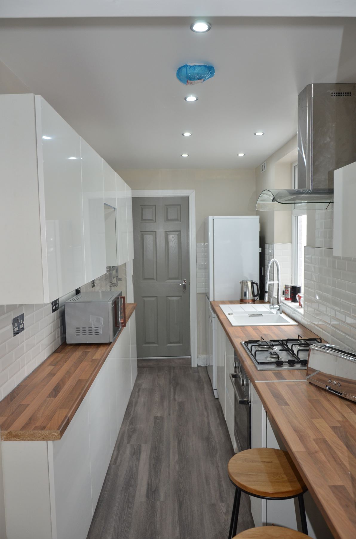 Kitchen view towards hallway after refurbishment