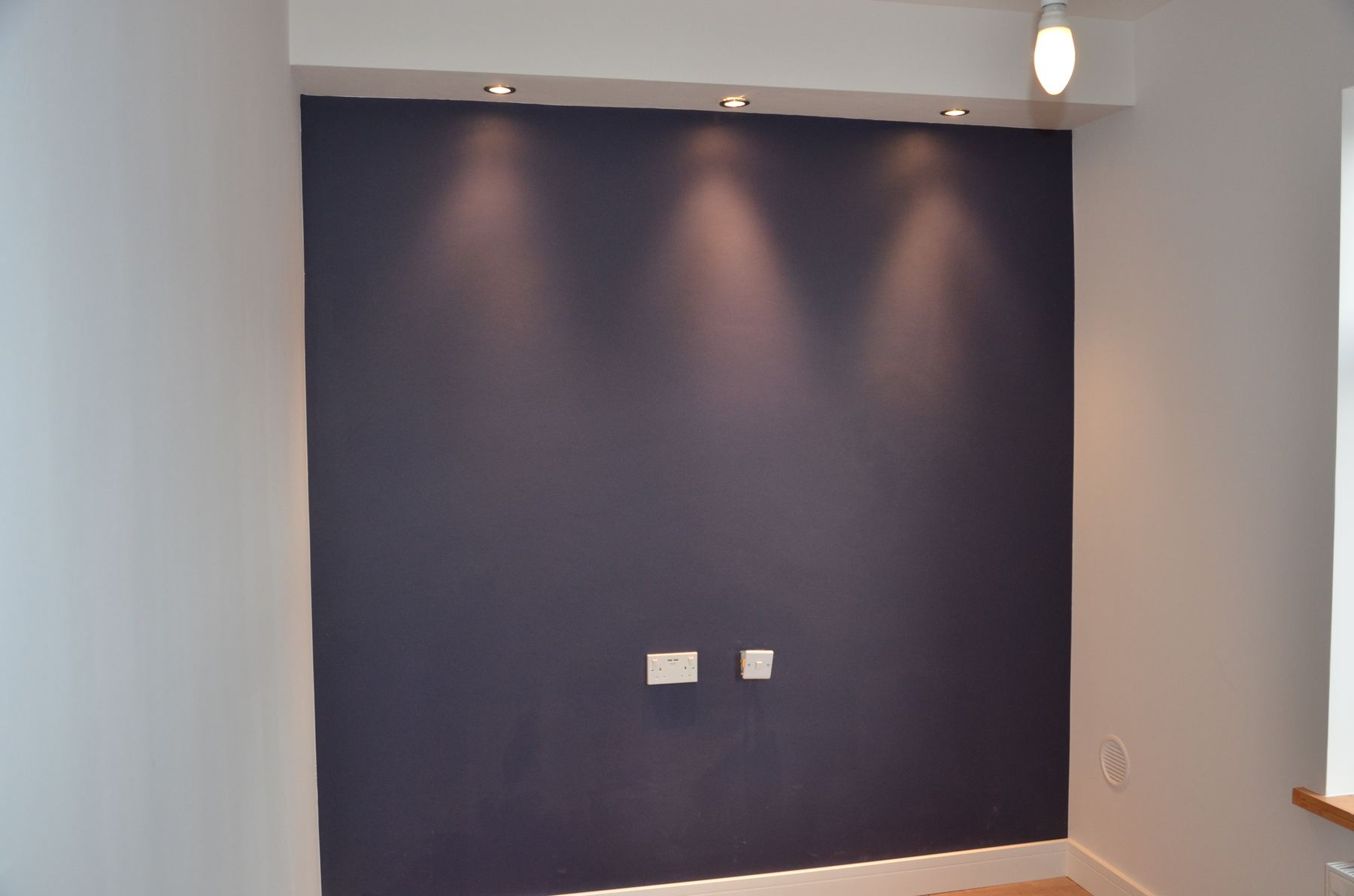 Room finish with feature wall after refurbishment